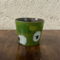 Handmade ceramic mug with sheep and clouds design, green glaze, food-safe tableware