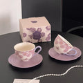 Floral ceramic tea cup and saucer set with matching gift box, delicate purple flowers and butterflies design